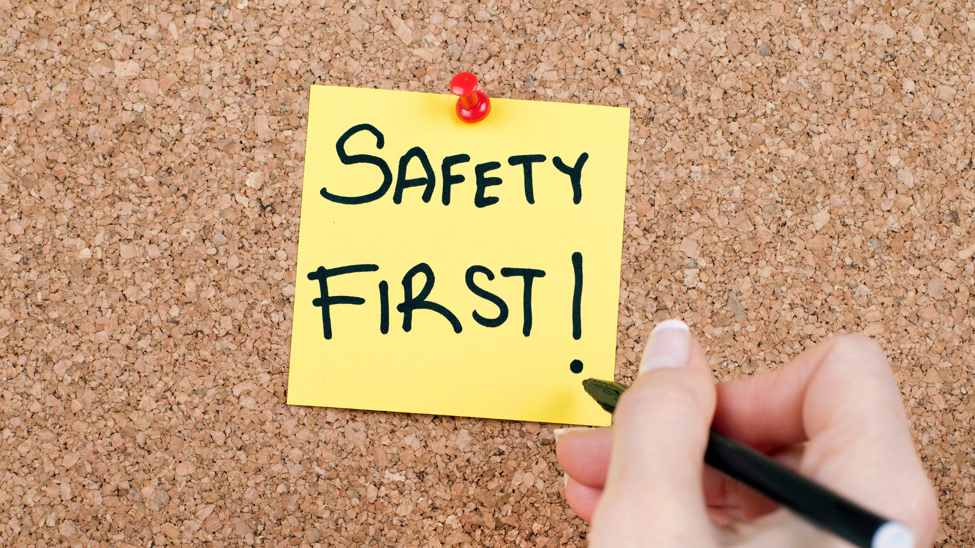 A yellow square sticky note that reads: Safety First!