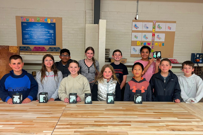 Draper students engrave Halloween lanterns in technology club